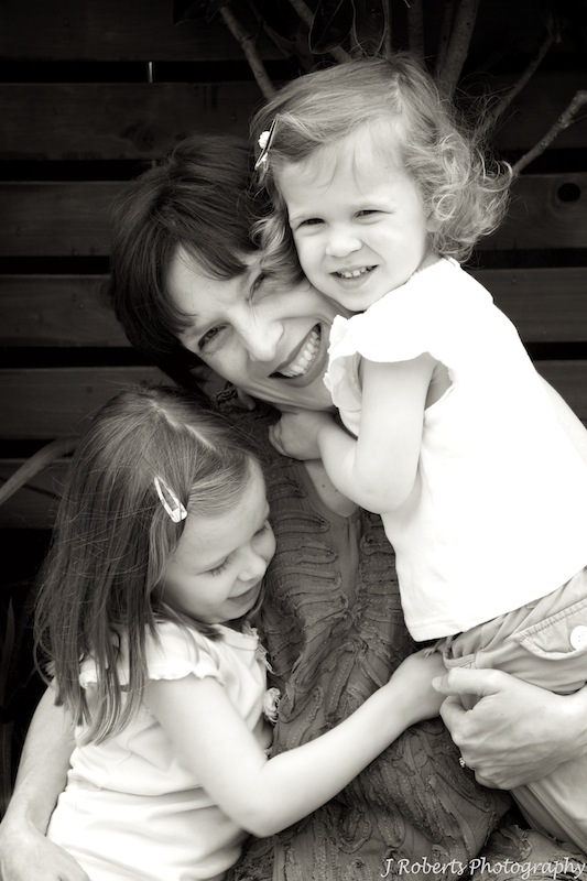 Mother and daughters - family portrait photography